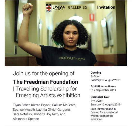 Woman with curly hair with arm raised showing a fist, wearing a black tshirt reading ColouredTM image sits about text detailing the exhibition.